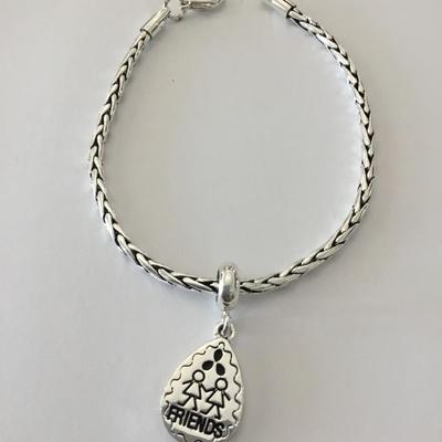 Very nice Silvertone friends charm bracelet. Very nice quality.
