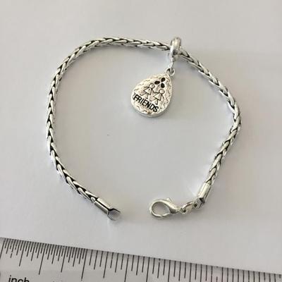 Very nice Silvertone friends charm bracelet. Very nice quality.