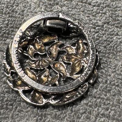 Botanical brooch, intricate design of leaves and acorns