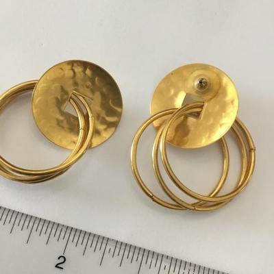 Beautiful hammered gold, toned statement earrings. Very nice