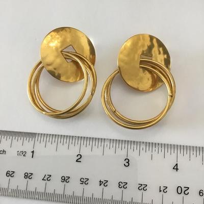 Beautiful hammered gold, toned statement earrings. Very nice