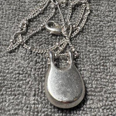 LIA SOPHIA necklace a striking navy blue oval-shaped pendant.