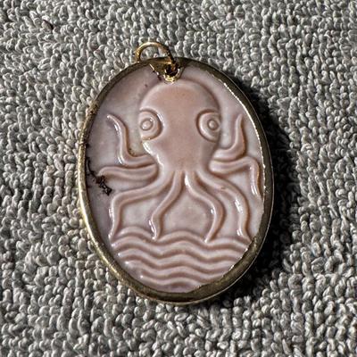Octopus cameo pendant.