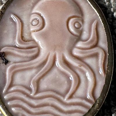 Octopus cameo pendant.