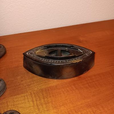 CAST IRON SHOE FORMS AND A CAST CLOTHES IRON