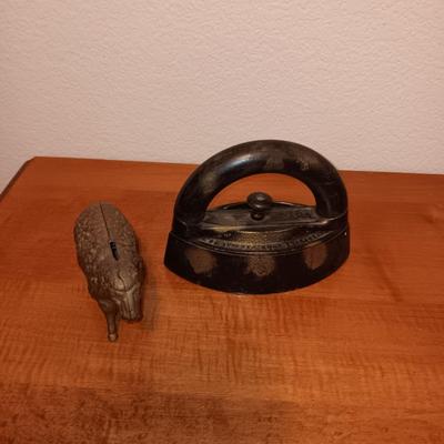 CAST IRON LAMB COIN BANK AND A CAST CLOTHES IRON