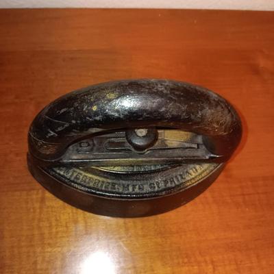 CAST IRON LAMB COIN BANK AND A CAST CLOTHES IRON