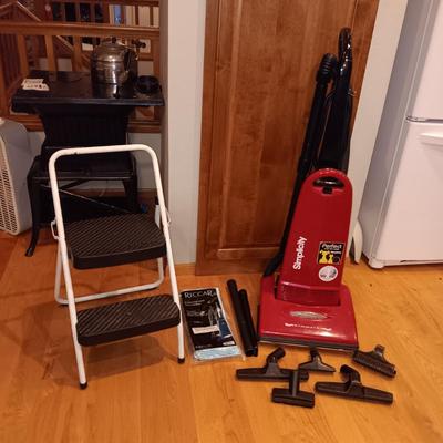 SIMPLICITY VACUUM WITH ATTACHMENTS AND FOLDING STEP STOOL