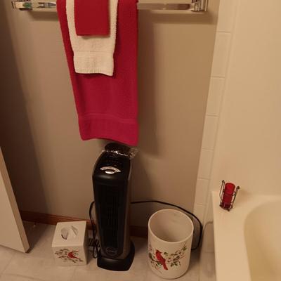 LASKO HEATER WITH REMOTE, CARDINAL CERAMIC WASTE CAN AND KLEENEX HOLDER PLUS A SET OF TOWELS