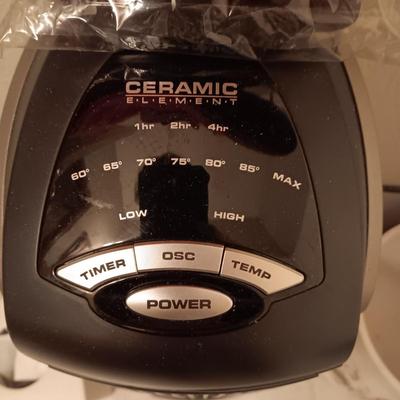 LASKO HEATER WITH REMOTE, CARDINAL CERAMIC WASTE CAN AND KLEENEX HOLDER PLUS A SET OF TOWELS