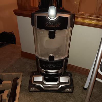 SHARK NAVIGATOR BAGLESS VACUUM AND A FOLDING STEP STOOL