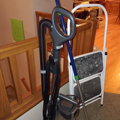 SHARK NAVIGATOR BAGLESS VACUUM AND A FOLDING STEP STOOL