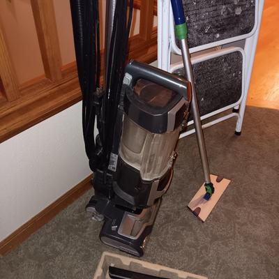 SHARK NAVIGATOR BAGLESS VACUUM AND A FOLDING STEP STOOL