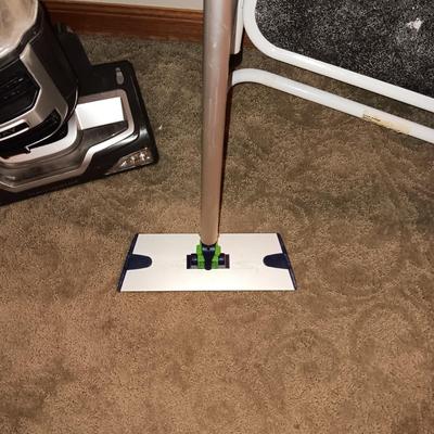 SHARK NAVIGATOR BAGLESS VACUUM AND A FOLDING STEP STOOL