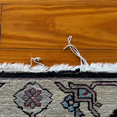 Sale Photo Thumbnail #35: Measures 6' x 3'10"
Flat weave rug with small areas with thread slippage on fringe.