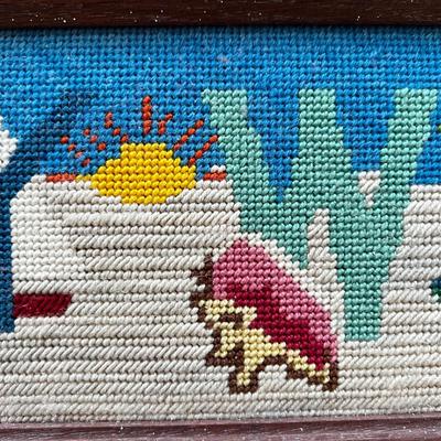 Sale Photo Thumbnail #67: Needle point is framed and measures 18.25" x 6.25" with table lamp with lamp shade that does not sit on straight measuring 14"H