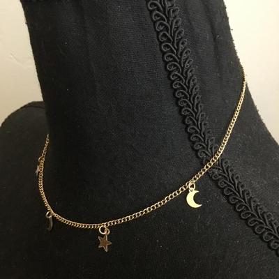 Cute, gold, toned star moon, charm necklace
