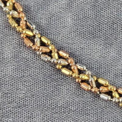 Lot 7: 14k- Tri-Gold 20" Braided Necklace - 10g