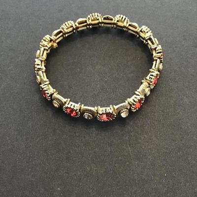Sale Photo Thumbnail #54: Beautiful vintage gold tone, stretchy fashion bracelet with rose and champagne, colored rhinestones. Please see attached photos.