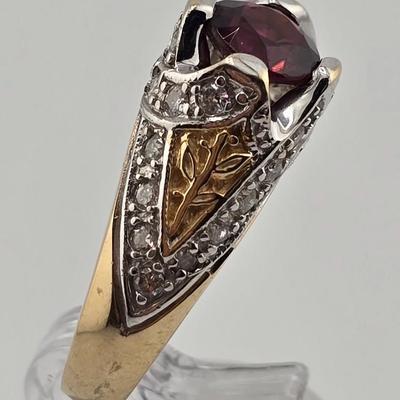 Lot 25: 14k Gold Ring with Garnet Center Stone and Diamond Accent Stones / Size 6.5 / 8g