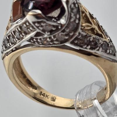 Lot 25: 14k Gold Ring with Garnet Center Stone and Diamond Accent Stones / Size 6.5 / 8g