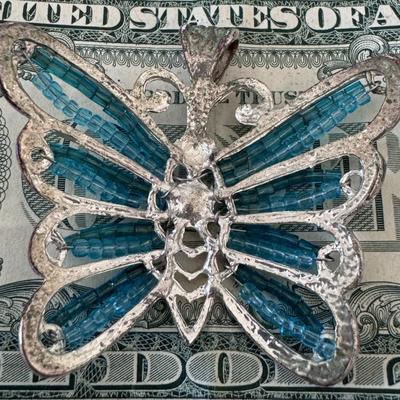 Blue beaded butterfly pendant,