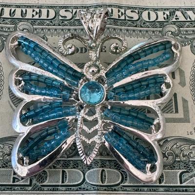 Blue beaded butterfly pendant,