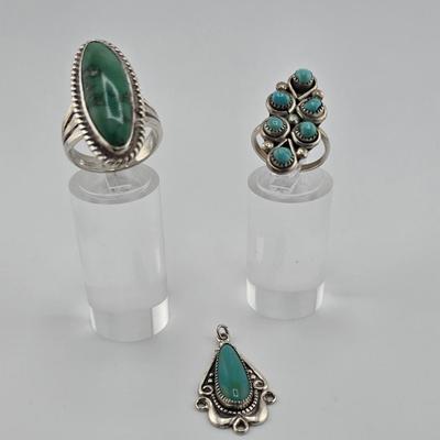 Lot 31: Two (2) Native American Style Rings w/ Stones & Silver Pendant / Sizes 5, 7.5