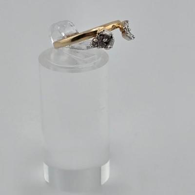 Lot 34: 14k Gold Wrap Ring with Baguette and Round Accent Diamonds - 2g / Size 5.5