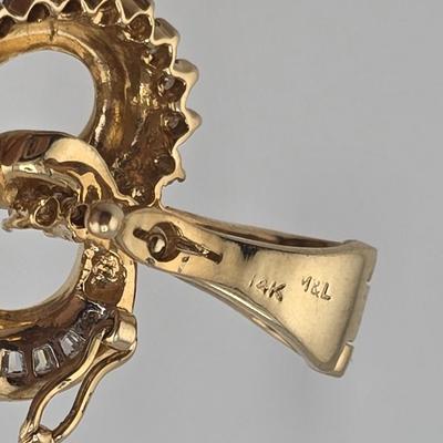 Lot 39: 14k Heart Shaped Gold Pendant with Baguette and Round Diamonds - 3g