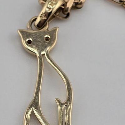 Lot 50: 7" - 10k Gold Bracelet & 10k Gold Cat Pendant with Diamond Eyes - 3g