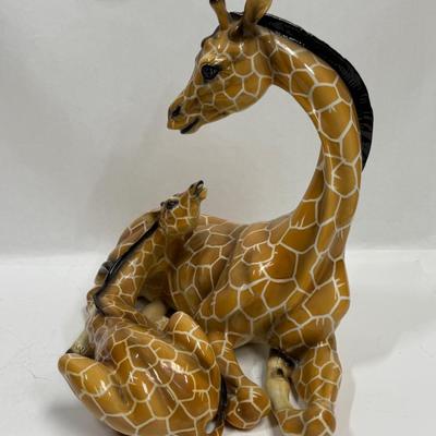 Sale Photo Thumbnail #13: Wonderful attention to detail. This porcelain ceramic statue is in very good condition.