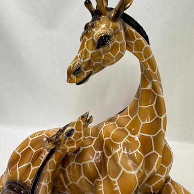 Sale Photo Thumbnail #6: Wonderful attention to detail. This porcelain ceramic statue is in very good condition.