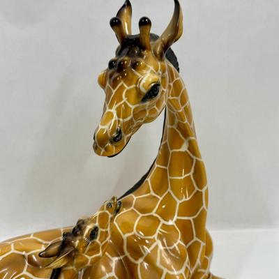 Sale Photo Thumbnail #15: Wonderful attention to detail. This porcelain ceramic statue is in very good condition.