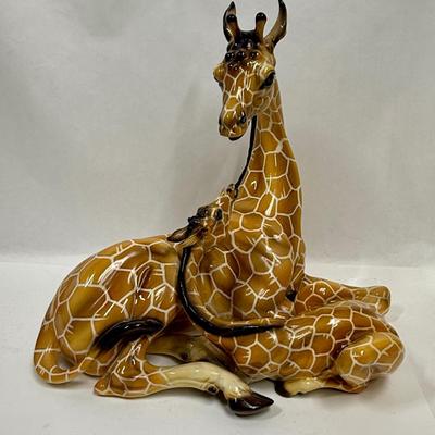 Sale Photo Thumbnail #7: Wonderful attention to detail. This porcelain ceramic statue is in very good condition.