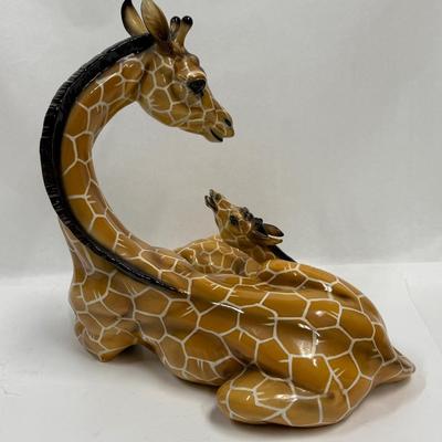 Sale Photo Thumbnail #10: Wonderful attention to detail. This porcelain ceramic statue is in very good condition.