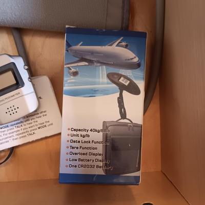 STEDI PEDI, BLOOD PRESSURE MONITOR, TRAVEL ALARM CLOCK, LUGGAGE SCALE, EUROPEAN ELECTRICAL OUTLET ADAPTER AND MORE