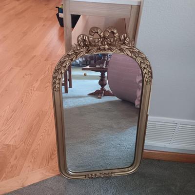 ANTIQUE WALL MIRROR AND AN UPHOLSTERED SWIVEL CHAIR