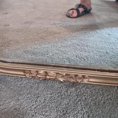 ANTIQUE WALL MIRROR AND AN UPHOLSTERED SWIVEL CHAIR