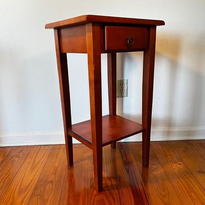Sale Photo Thumbnail #156: Dark stain oak table.
Measures 17”W x 12”D x 28”H