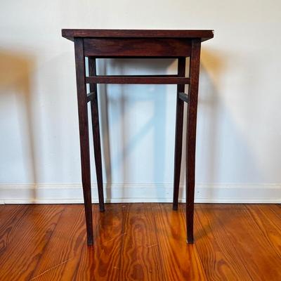 Sale Photo Thumbnail #157: Dark stain oak table.
Measures 17”W x 12”D x 28”H
