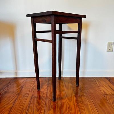 Sale Photo Thumbnail #159: Dark stain oak table.
Measures 17”W x 12”D x 28”H