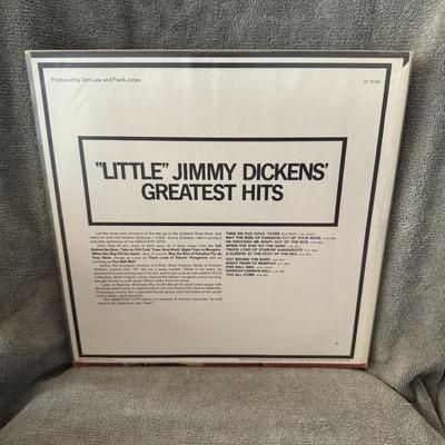 Sale Photo Thumbnail #397: "Little" Jimmy Dickens' Greatest Hits, a compilation album by the legendary country music artist, "Little" Jimmy Dickens. 
Here's some information about the album:
Release and Chart Performance: This Greatest Hits album was released in 1966 on Columbia Re