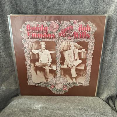 Sale Photo Thumbnail #450: "Buddy Emmons Sings Bob Wills".
Here's some information about this album:
Artist: Buddy Emmons, a renowned American steel guitar player.
Tribute: The album is a tribute to the legendary Western swing pioneer, Bob Wills.
Release Year & Label: It was releas