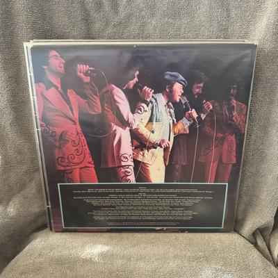 Sale Photo Thumbnail #481: Roy Clark In Concert. 
Here is information about the album:
Artist: Roy Clark.
Title: In Concert.
Release Year: 1976.
Record Label: ABC Records (also mentioned as ABC Dot or Dot Records, as Dot was a subsidiary of ABC).
Format: 12-inch 33 1/3 RPM Vinyl LP