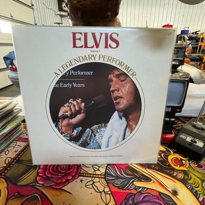 Sale Photo Thumbnail #104: Elvis: A Legendary Performer Volume 1 by Elvis Presley. 
Here's more information about this album:
Release Information: It is a compilation album released in 1974 by RCA Records.
Content: The album features a collection of tracks, including twelve songs a