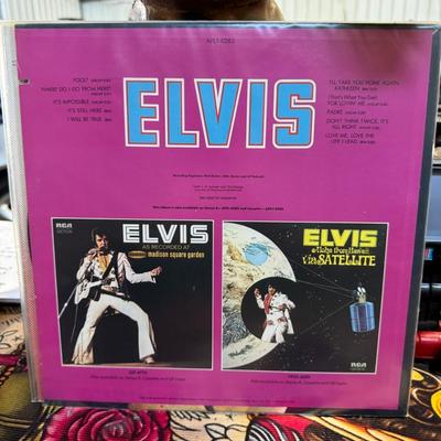 Sale Photo Thumbnail #87: "Elvis," released in 1973, features Elvis Presley. 
Additional details about the album include:
Release Information: The album was released on RCA Records in 1973 under the catalog number APL1-0283.
Track Listing: The album includes songs such as "Fool," 
