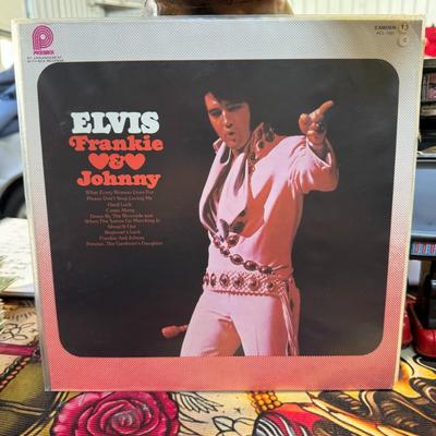 Sale Photo Thumbnail #88: Elvis Presley LP record titled "Frankie & Johnny," released by Pickwick/Camden with the catalog number ACL-7007. 
Here's some information about this specific record:
Release Details: This is a 1975 reissue of the soundtrack album for the 1966 film Frankie
