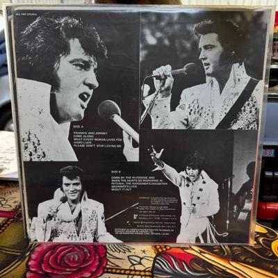 Sale Photo Thumbnail #89: Elvis Presley LP record titled "Frankie & Johnny," released by Pickwick/Camden with the catalog number ACL-7007. 
Here's some information about this specific record:
Release Details: This is a 1975 reissue of the soundtrack album for the 1966 film Frankie