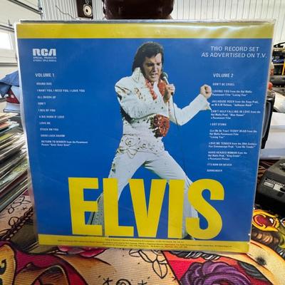 Sale Photo Thumbnail #187: Elvis Presley double LP vinyl album, released by RCA Records in 1973. 
Here's more information about this album:
Title: Simply titled "ELVIS", as prominently displayed on the cover.
Format: It is a double LP (2 Big LP's/2 Disques), indicated on the cover 